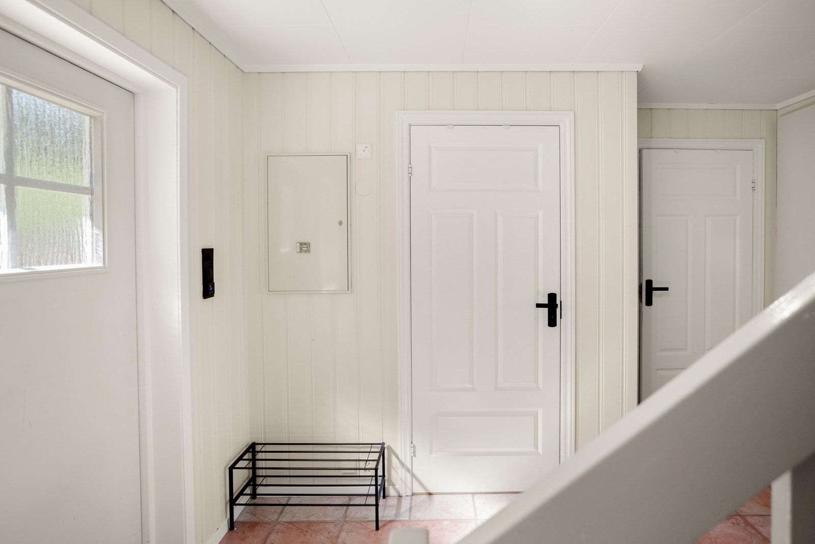 Fra inngangspartiet har du tilgang til badet og vaskerommet. Galleribilde