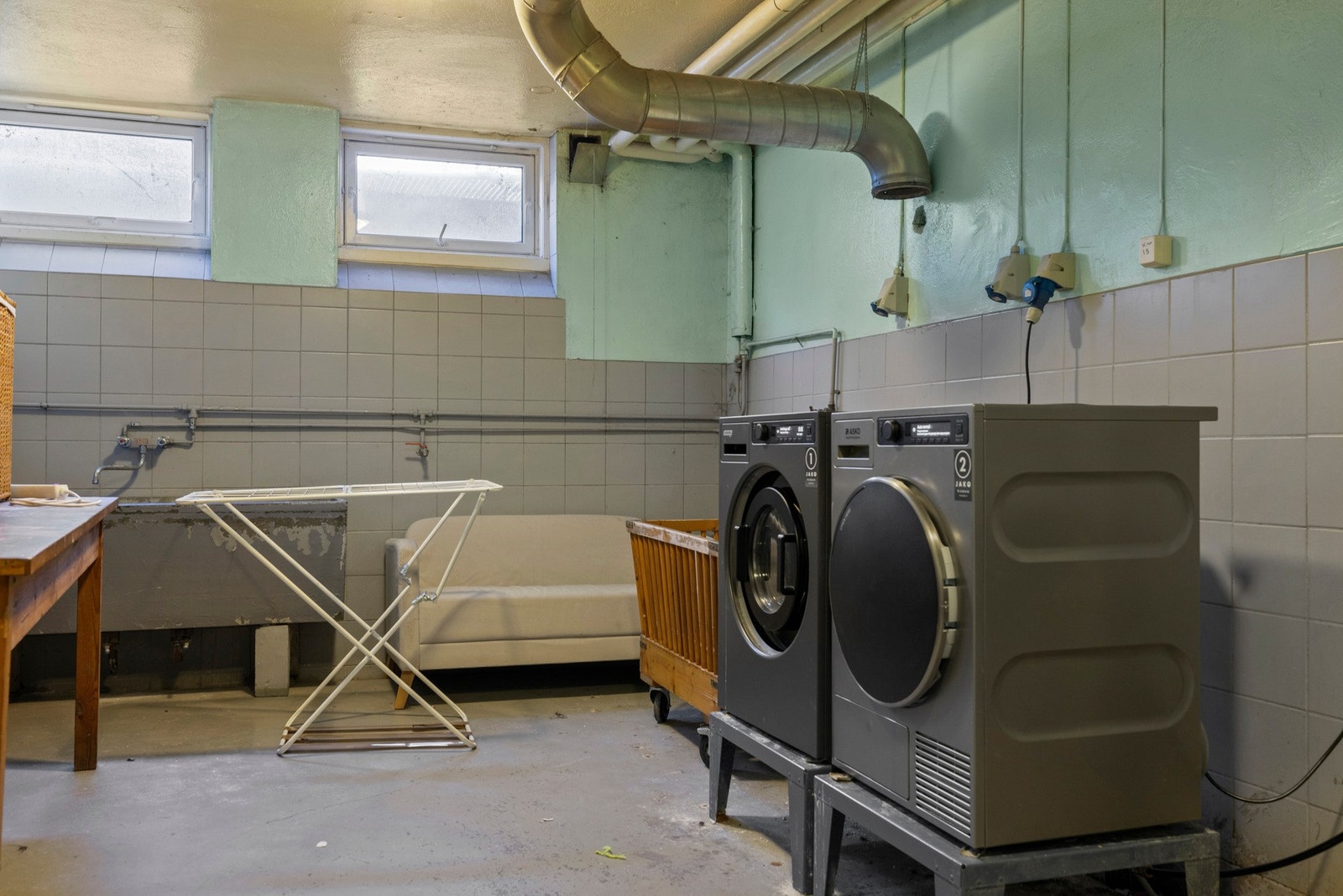 Det er felles vaskeri beliggende i kjelleren. Galleribilde