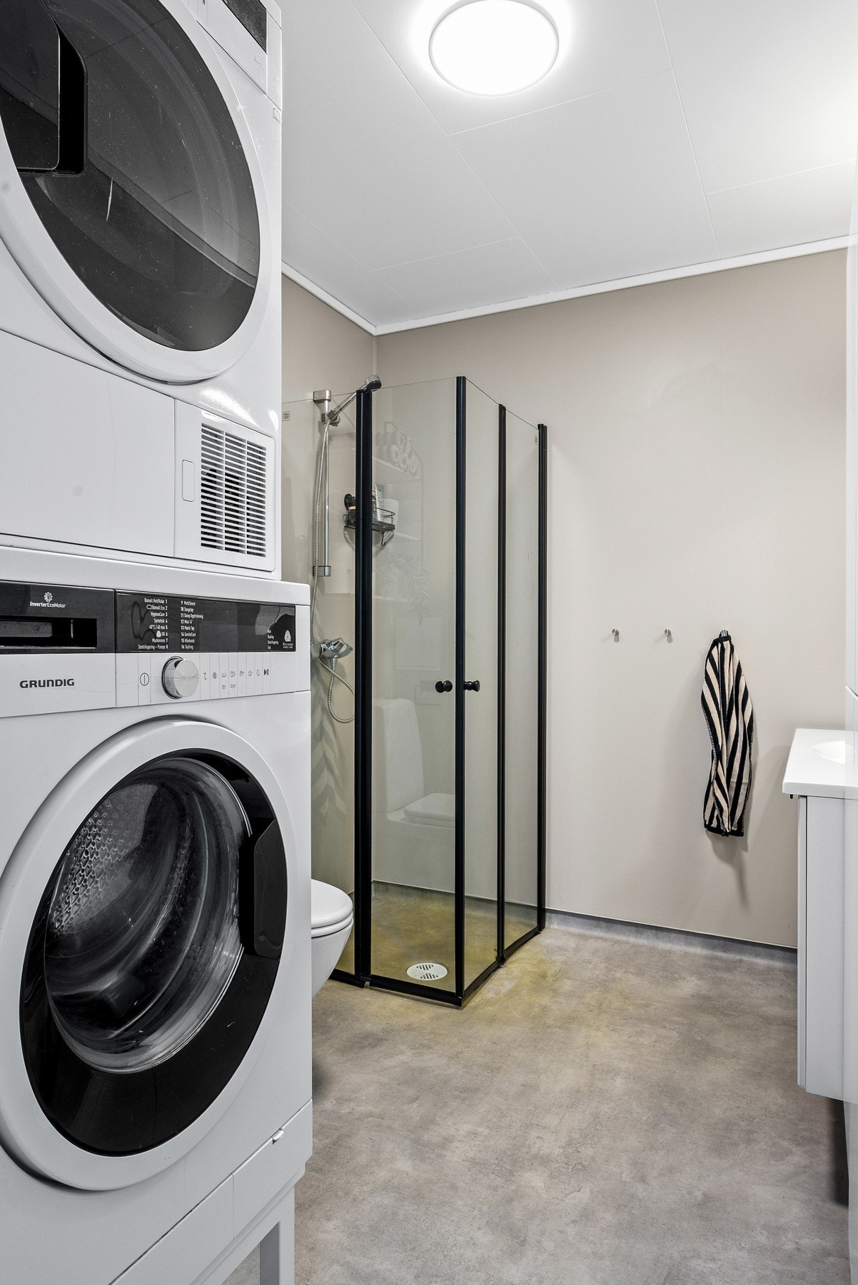 Badet disponerer opplegg til vaskemaskin. Galleribilde