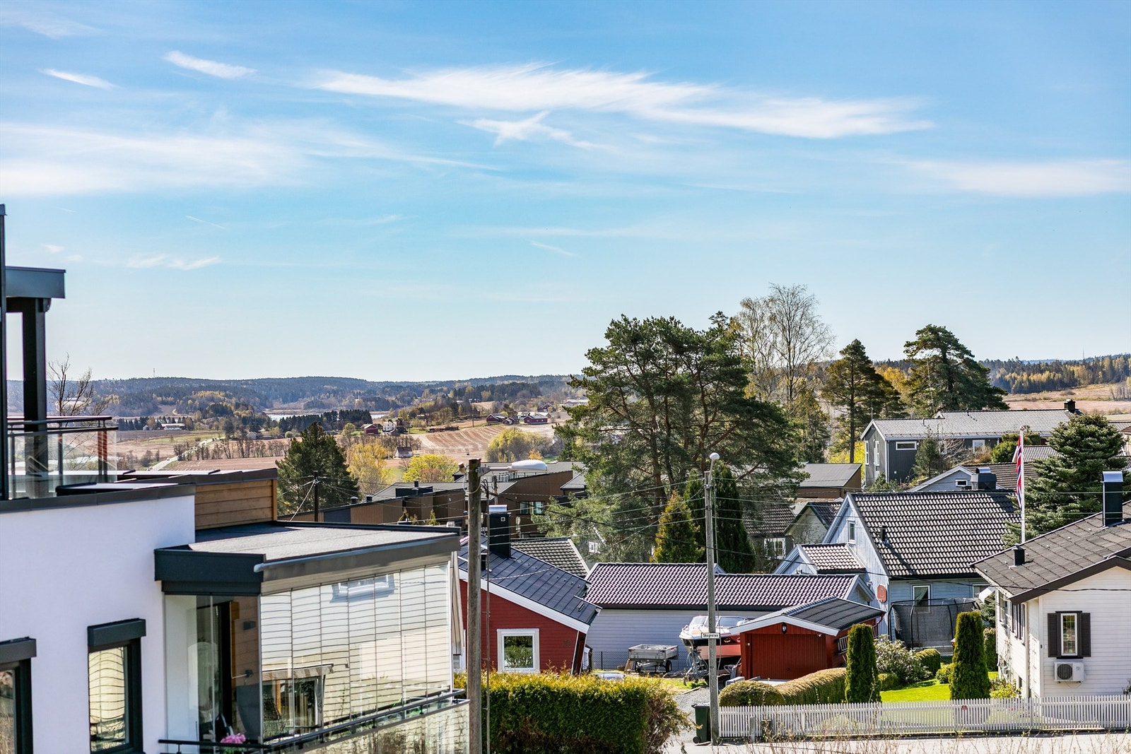 Utsikt til Skinnerflo over jordbrukslandskapet på Rådesletta - fremhevet med zoom. Galleribilde