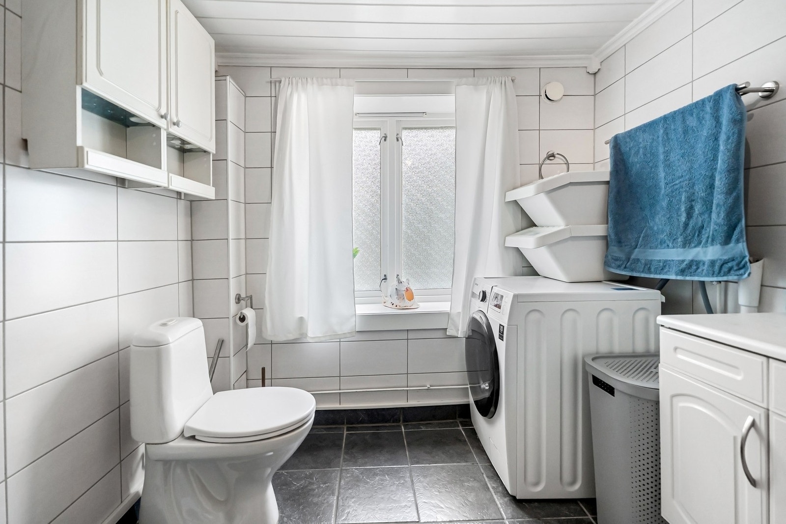 Det er god plass til vaskemaskin og tørketrommel. Galleribilde