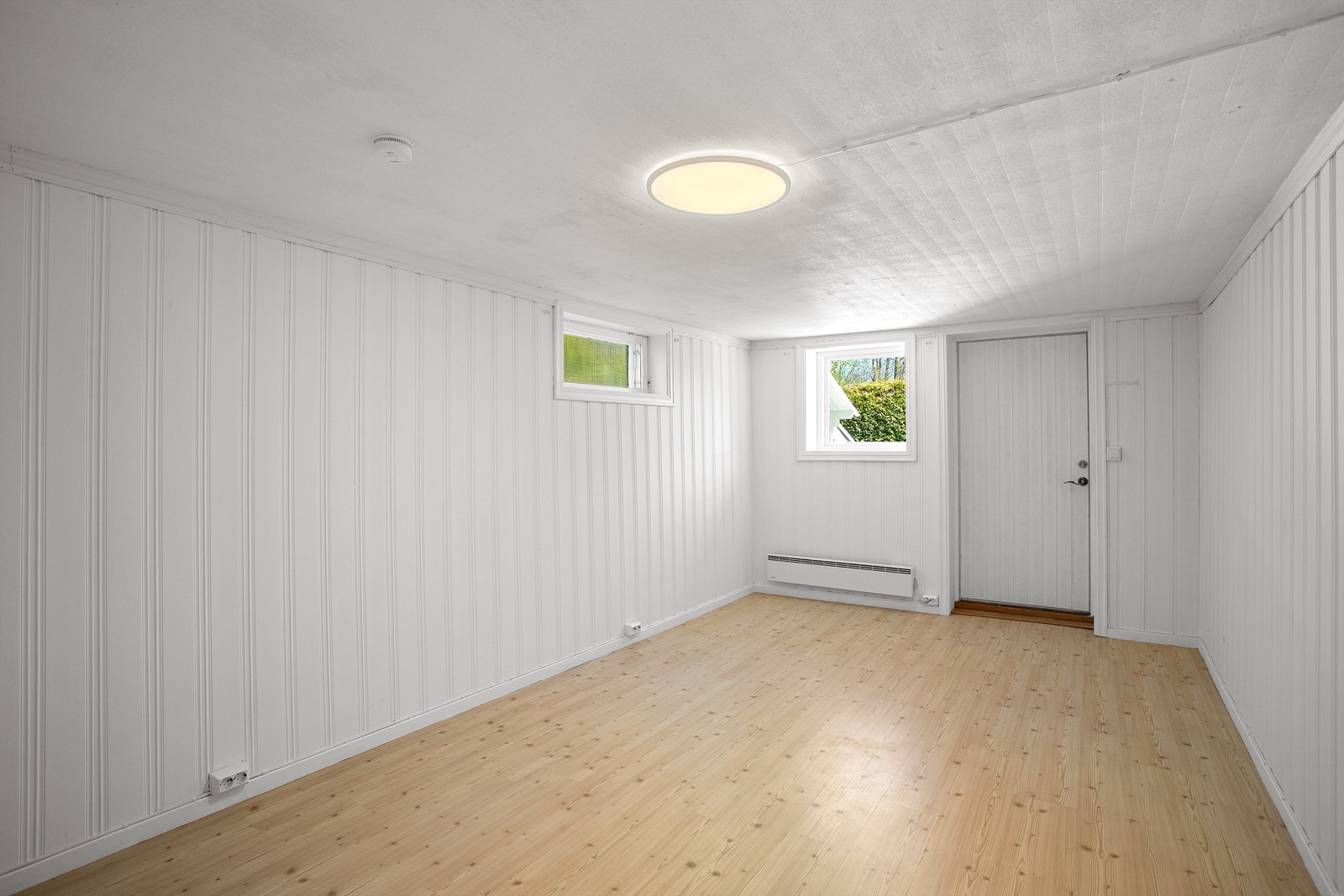 Soverommet i underetasjen har også utvendig adkomst, i tillegg er det gulvvarme i rommet. Galleribilde