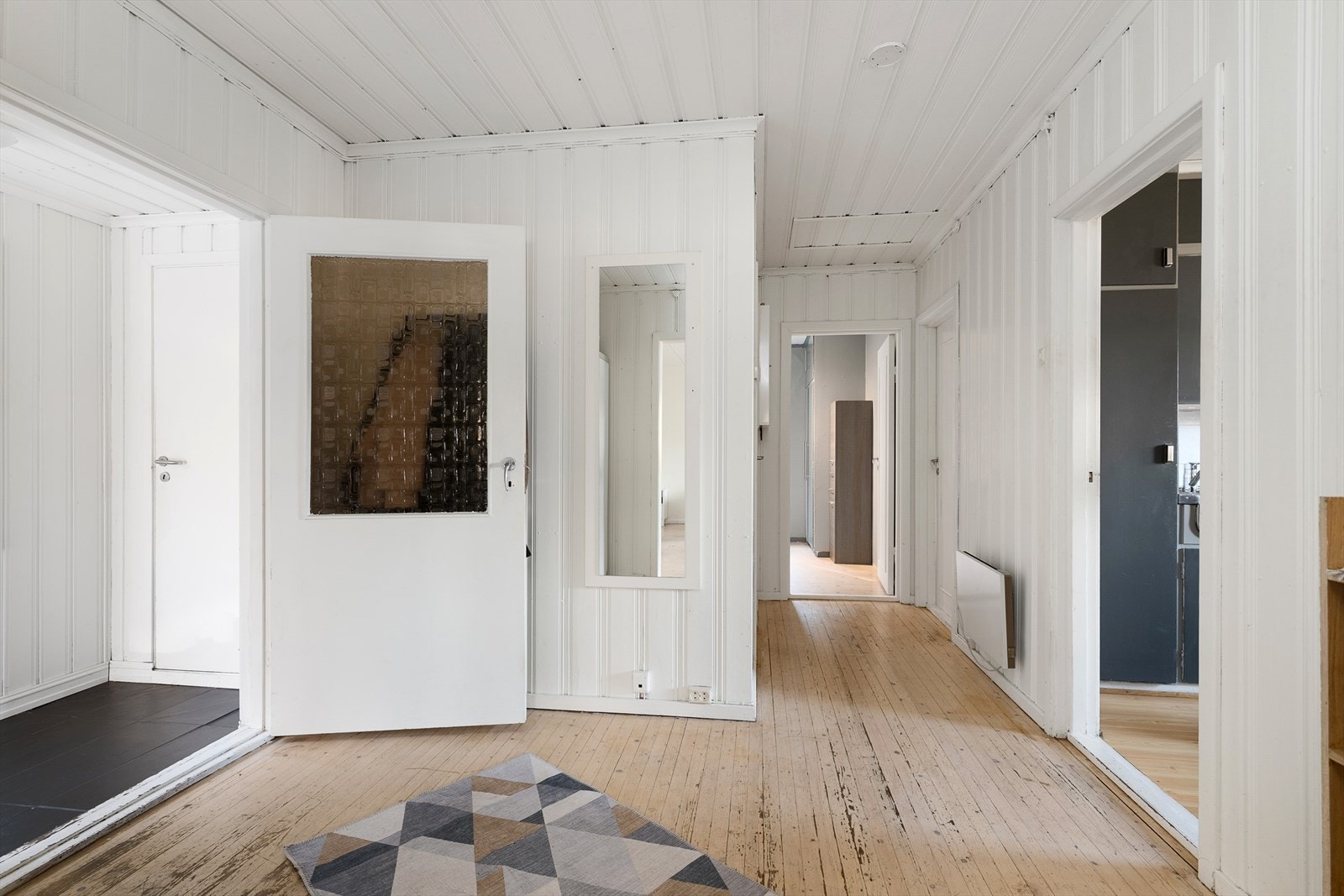 Fra gangen er det tilgang til boligens ulike rom. Galleribilde