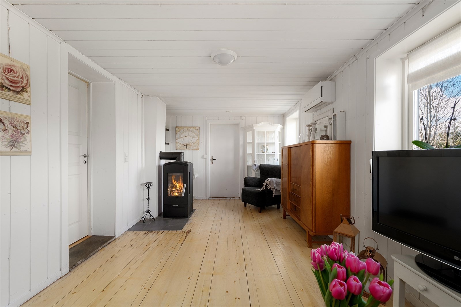 En vedovn sørger for varme. Galleribilde