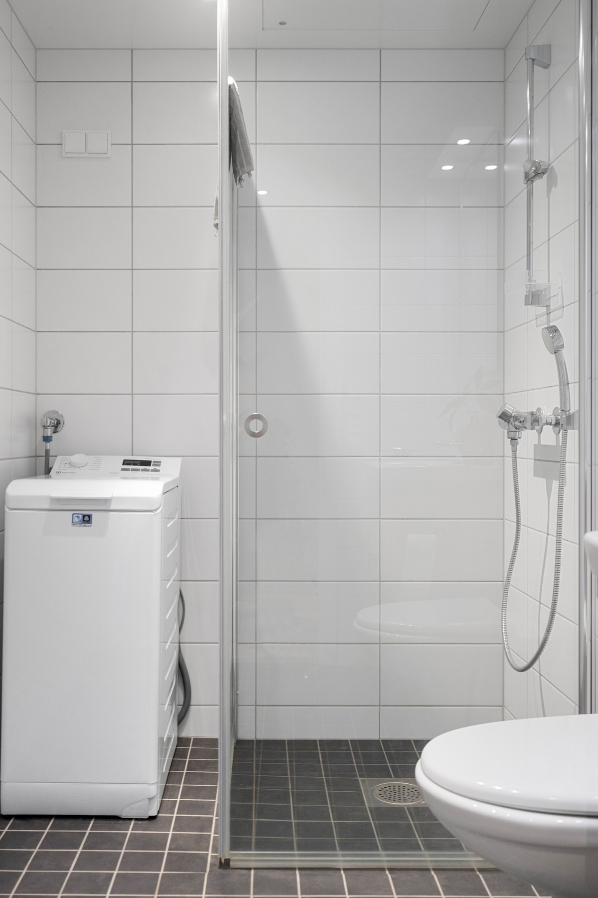 Dusjsone med glassvegger, som gir et stilrent og moderne uttrykk. Galleribilde