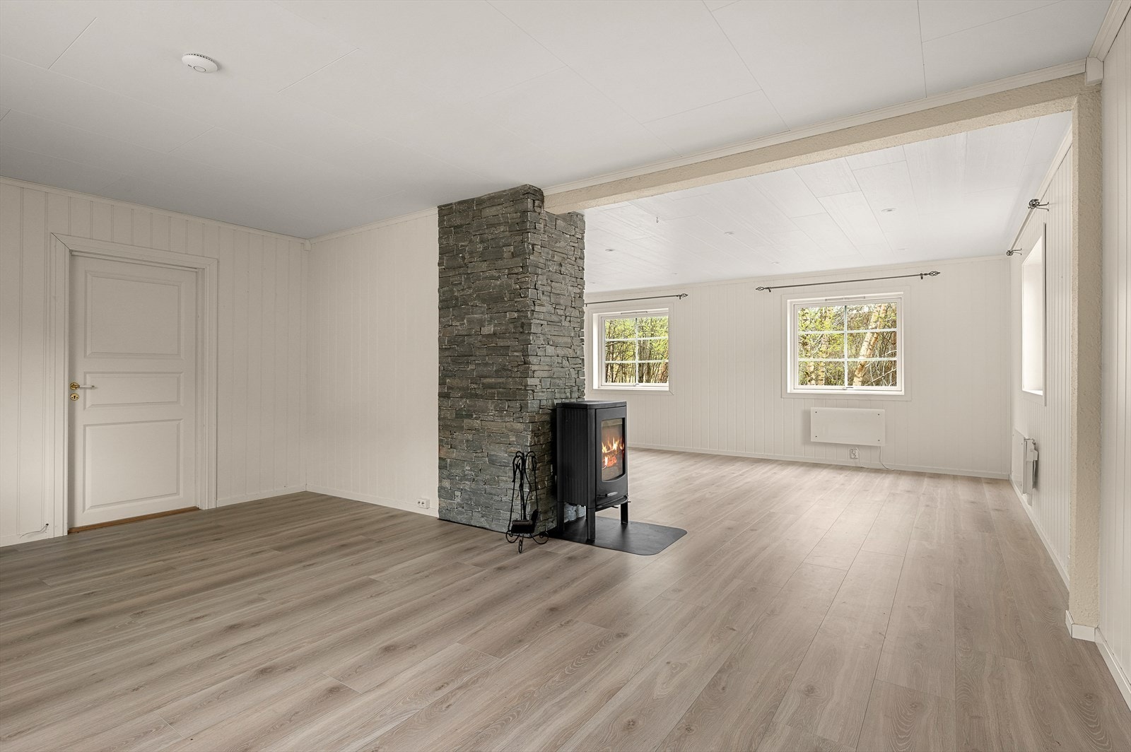 En innholdsrik eiendom med romslig tomt på 693 m² i frodige omgivelser. Galleribilde