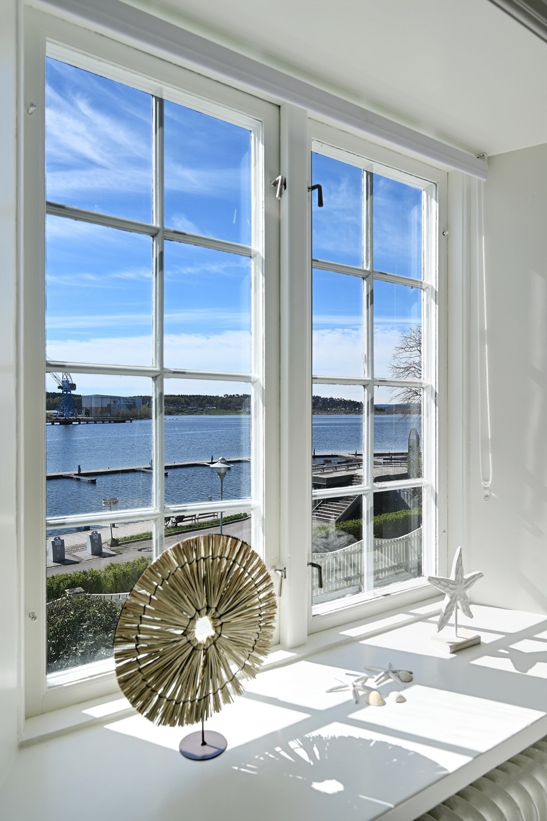 En levende utsikt som endrer seg med årstidene. Galleribilde