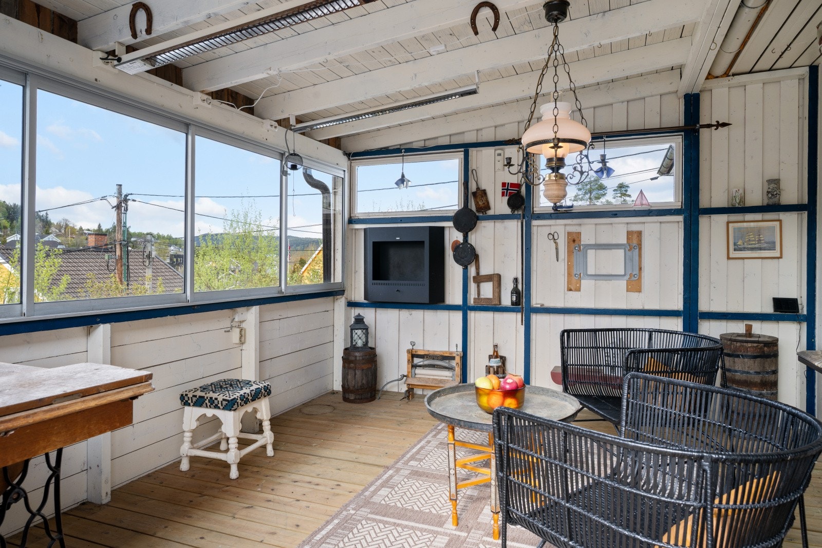 En del av terrassen er innglasset, noe som forlenger sesongen. Galleribilde
