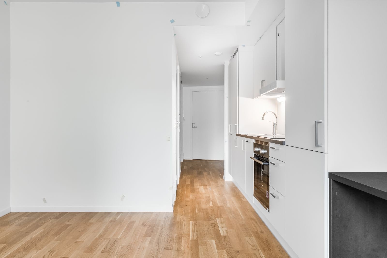 Stue/soverom med åpen kjøkkenløsning Galleribilde
