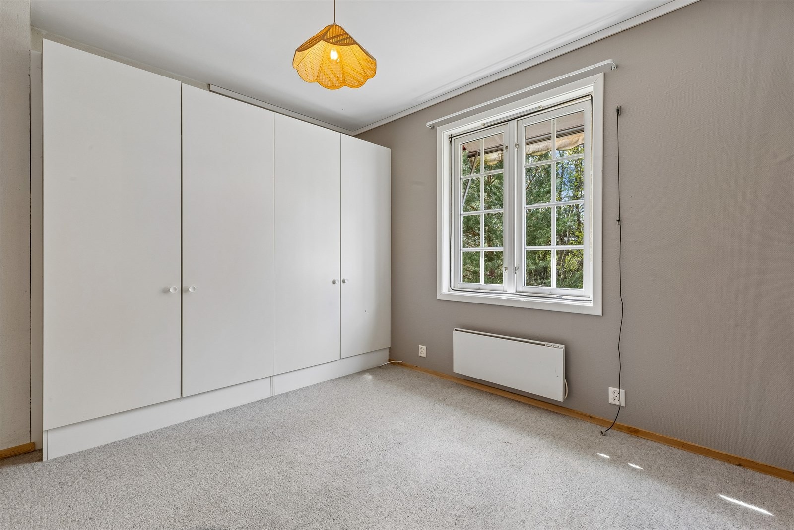 Det andre soverommet har også plass til både seng og oppbevaring. Galleribilde
