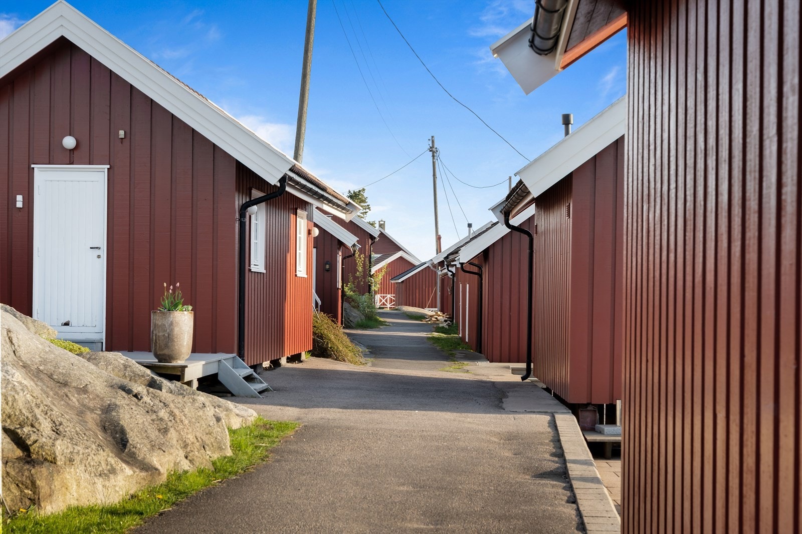 De gamle sjøbodene gir området en unik og autentisk karakter. Galleribilde