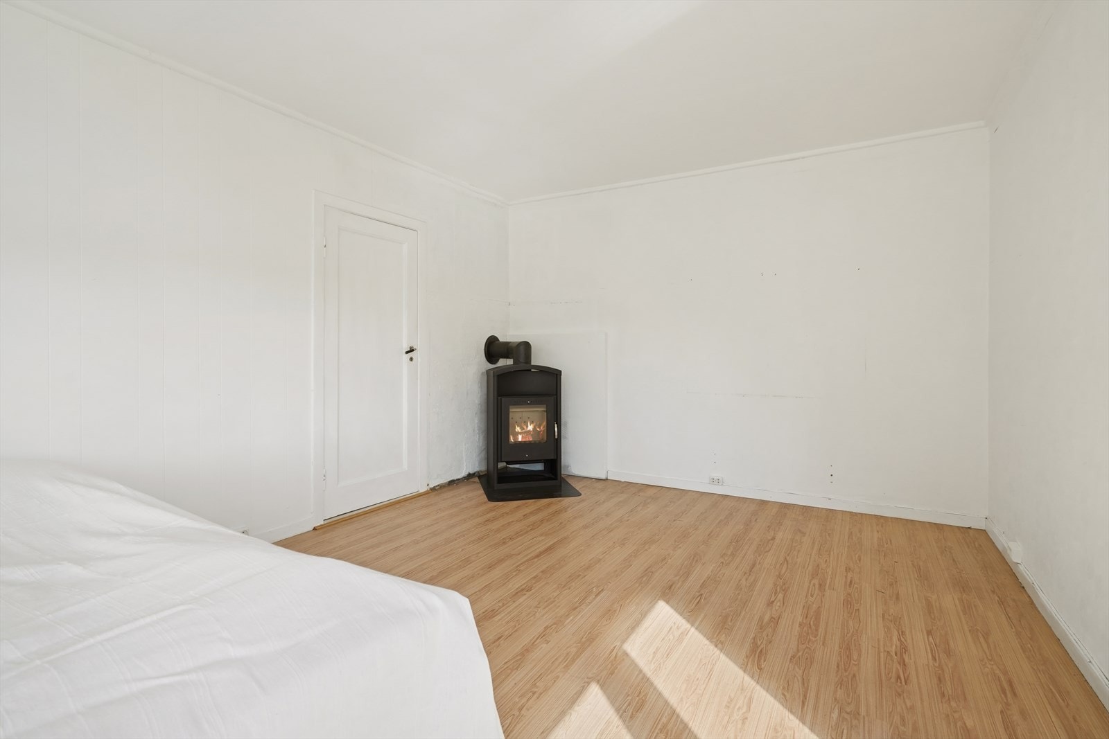 En vedovn sørger for ekstra varme og hygge. Galleribilde