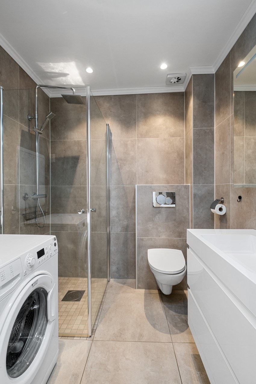 Badet har opplegg for vaskemaskin. Galleribilde