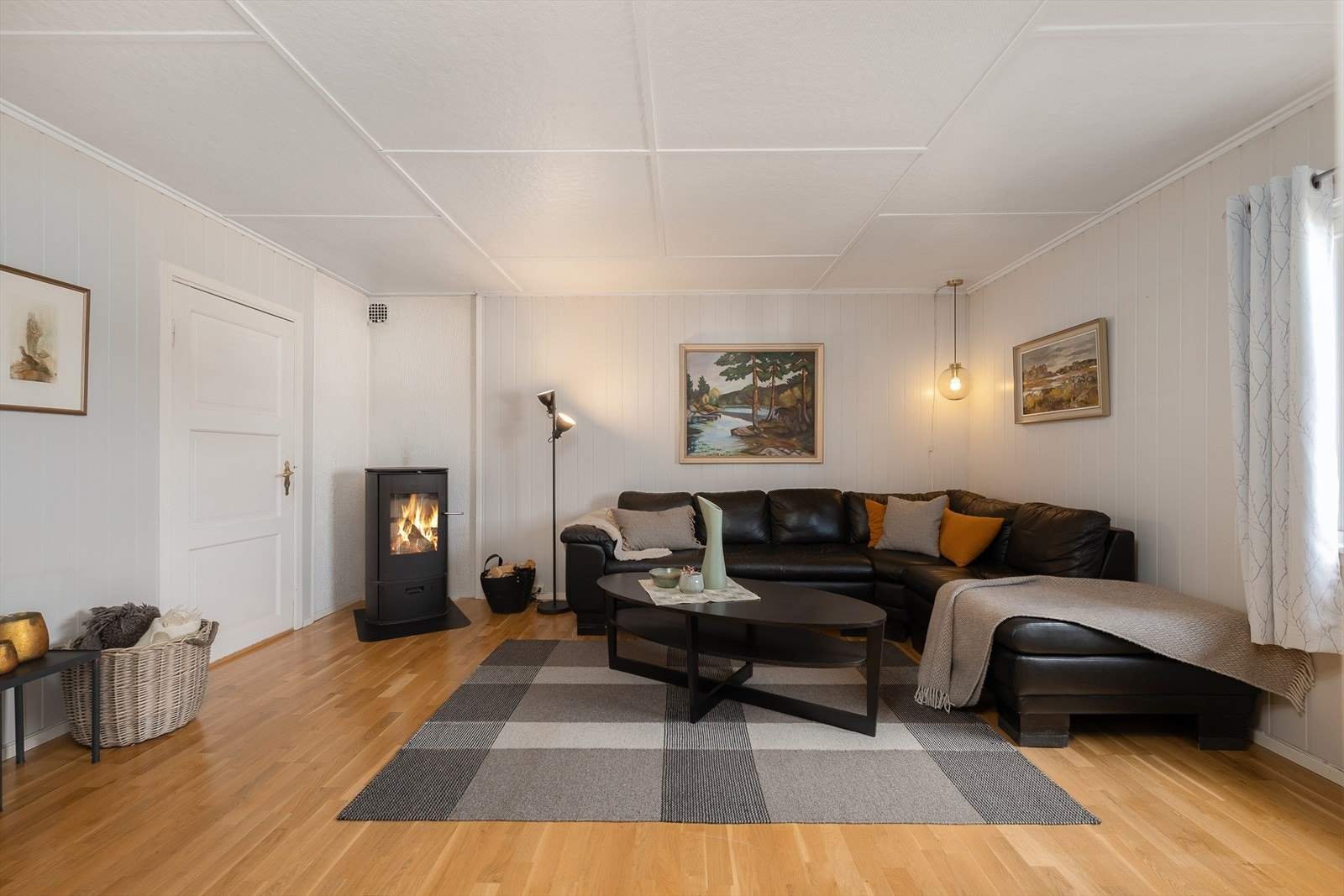 En vedovn tilkoblet teglsteinspipe gir ekstra varme og hygge på kalde dager. Galleribilde