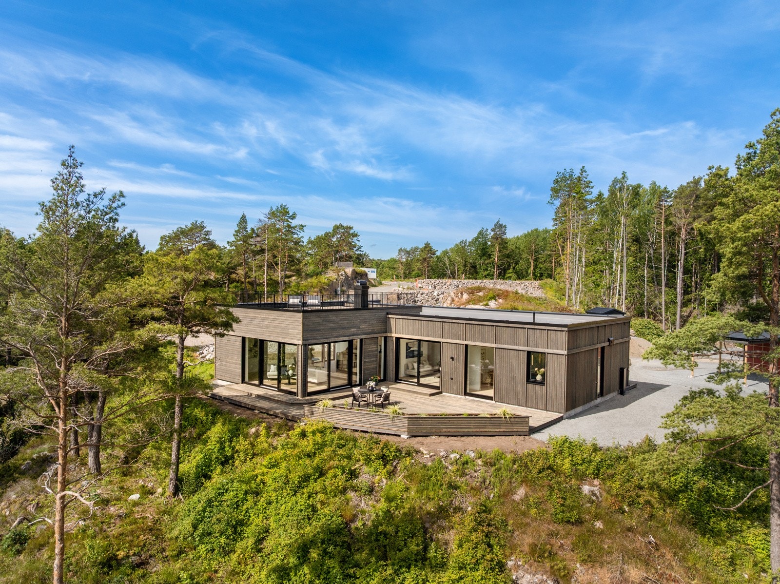 På tomt 3 er det allerede oppført en lekker enebolig. Galleribilde