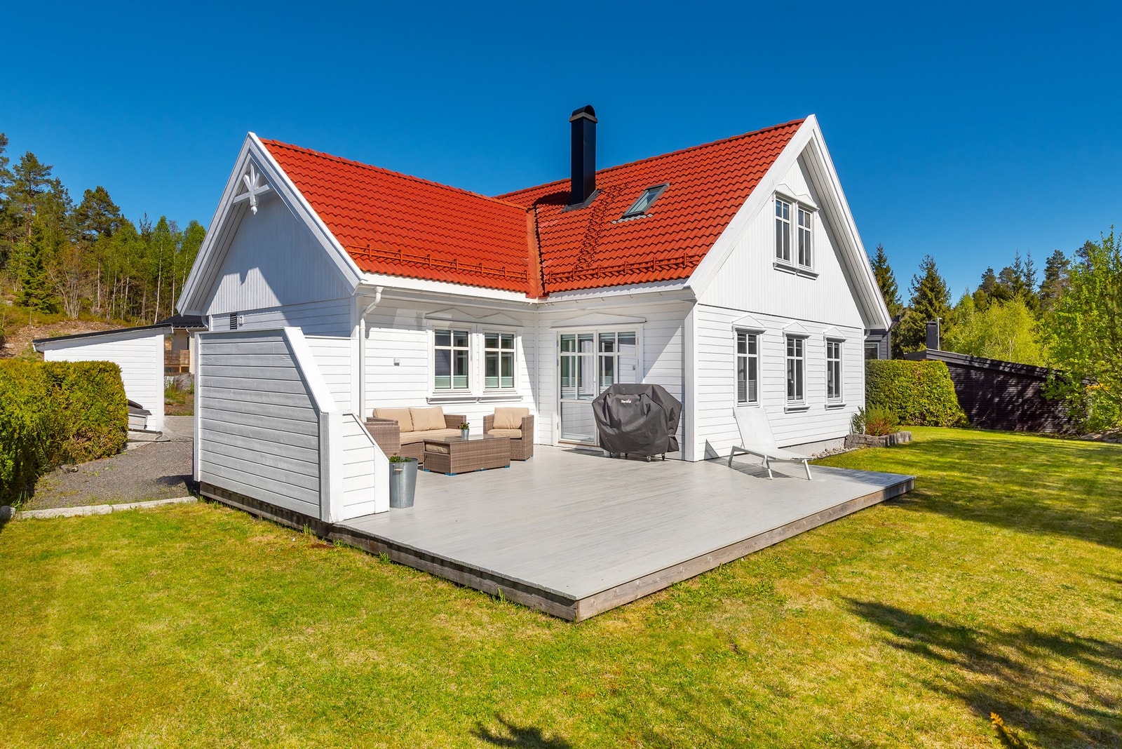 Lettstelt tomt med koselige uteplasser Galleribilde
