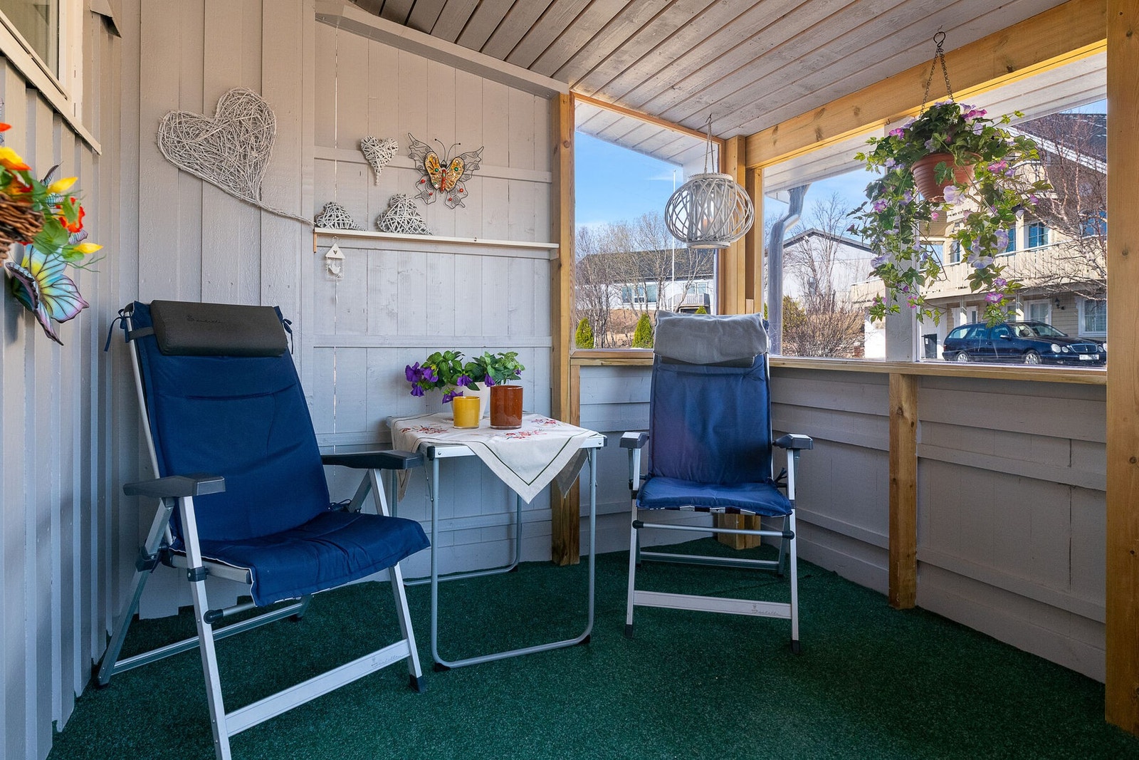 Innglasset uteområde like ved inngangspartiet. Galleribilde
