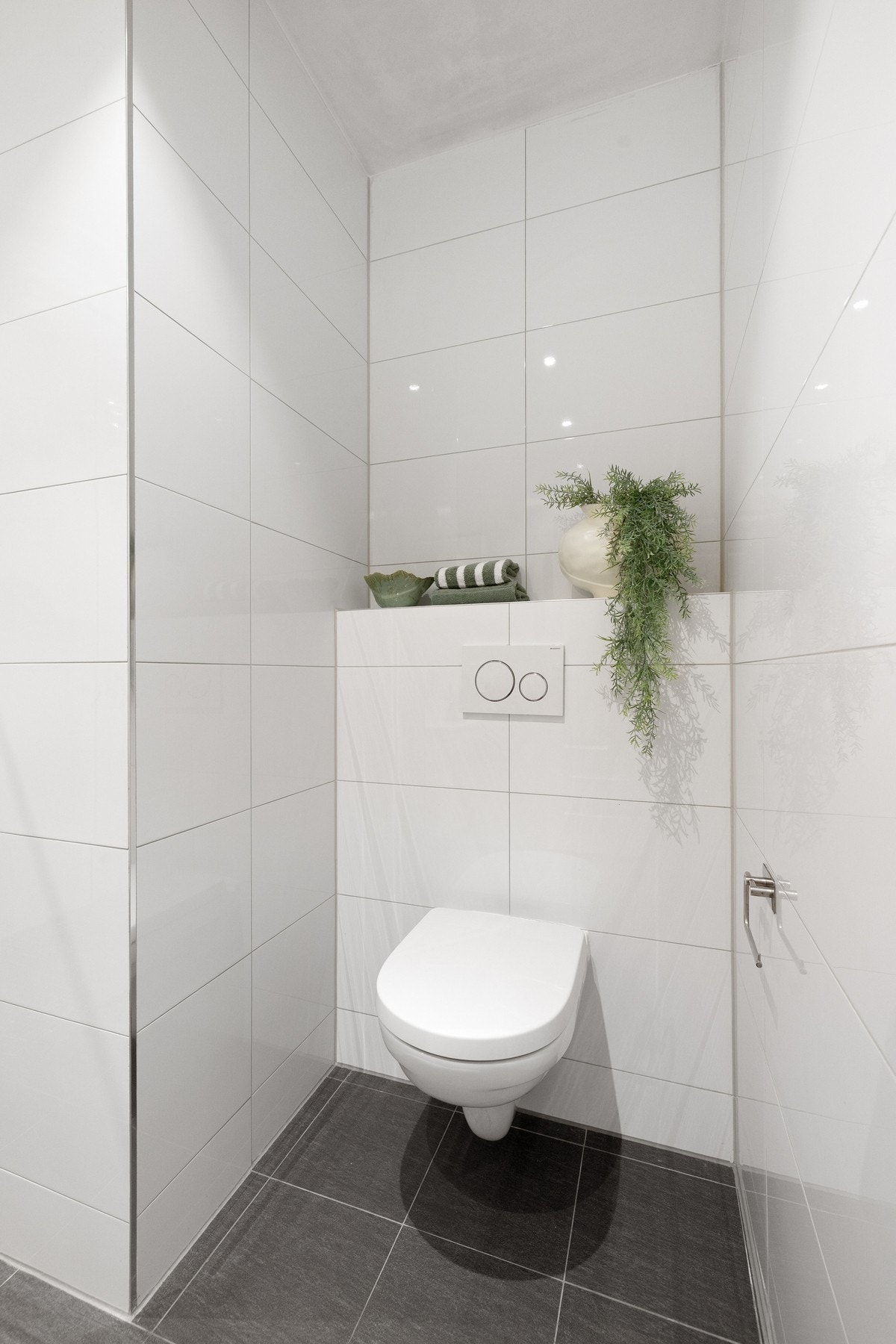 Det gjøres oppmerksom på at vaskemaskin er plassert én etasje ned, hvor alle beboere i aksjelaget disponerer hver sin vaskemaskin. Galleribilde