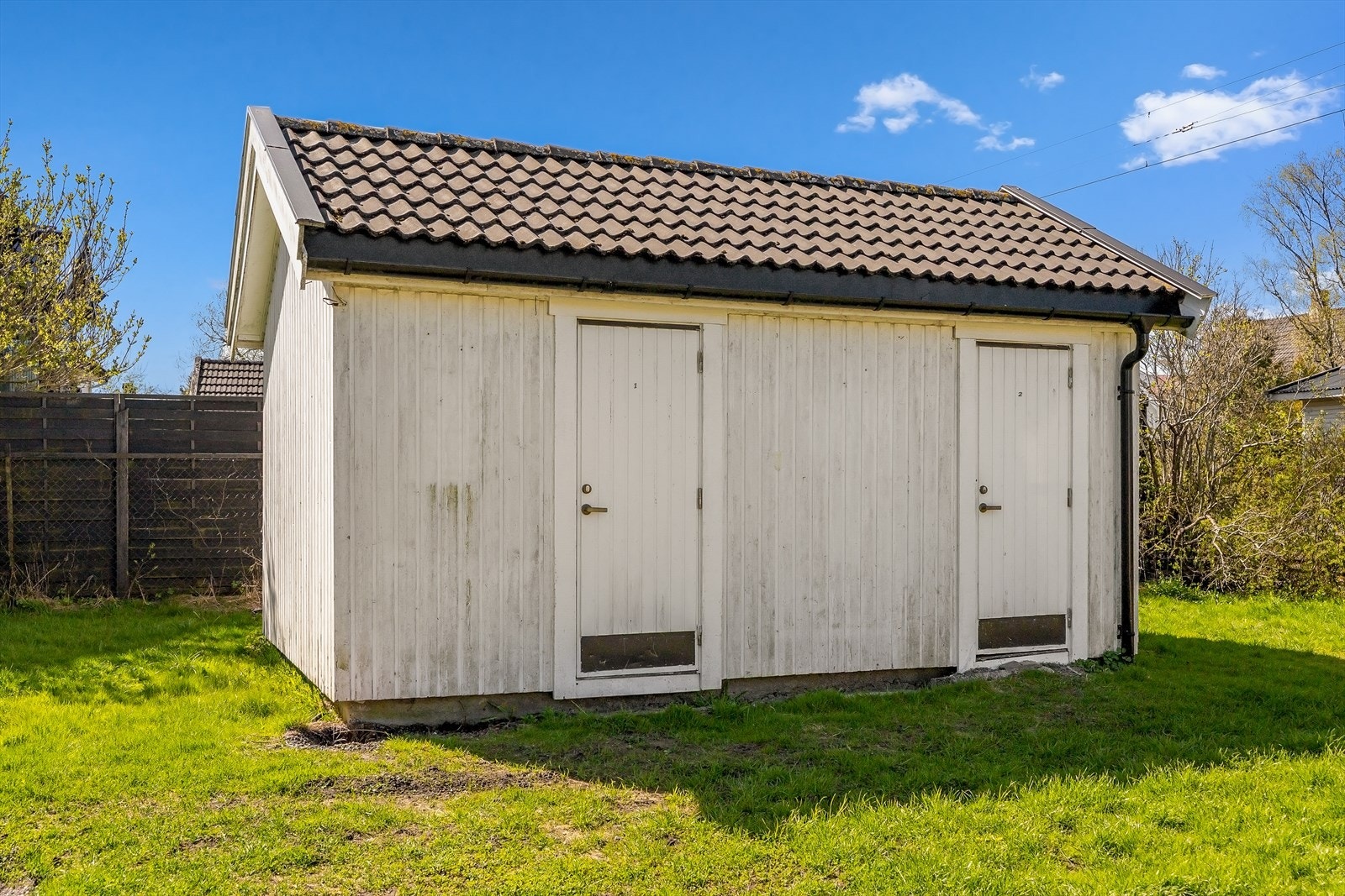 Frittstående bod på ca. 13,5 m², oppført i 1963. For denne foreligger det godkjente tegninger. Galleribilde