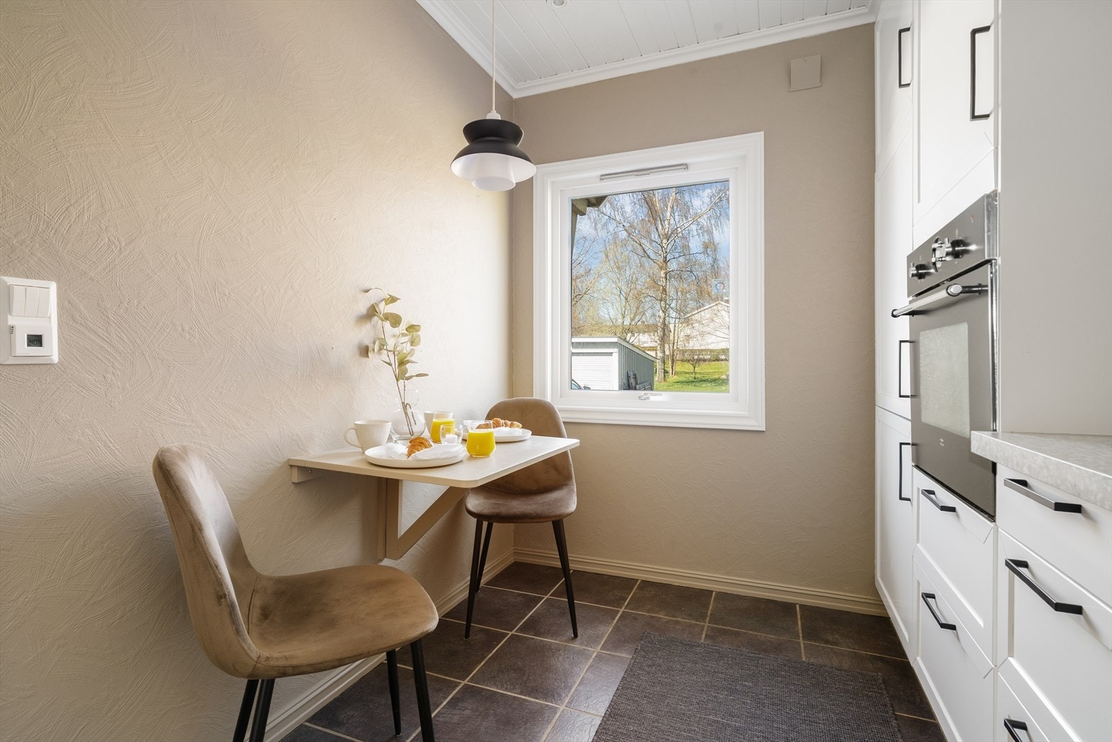 Flislagt gulv med gulvvarme gir en behagelig komfort. Galleribilde