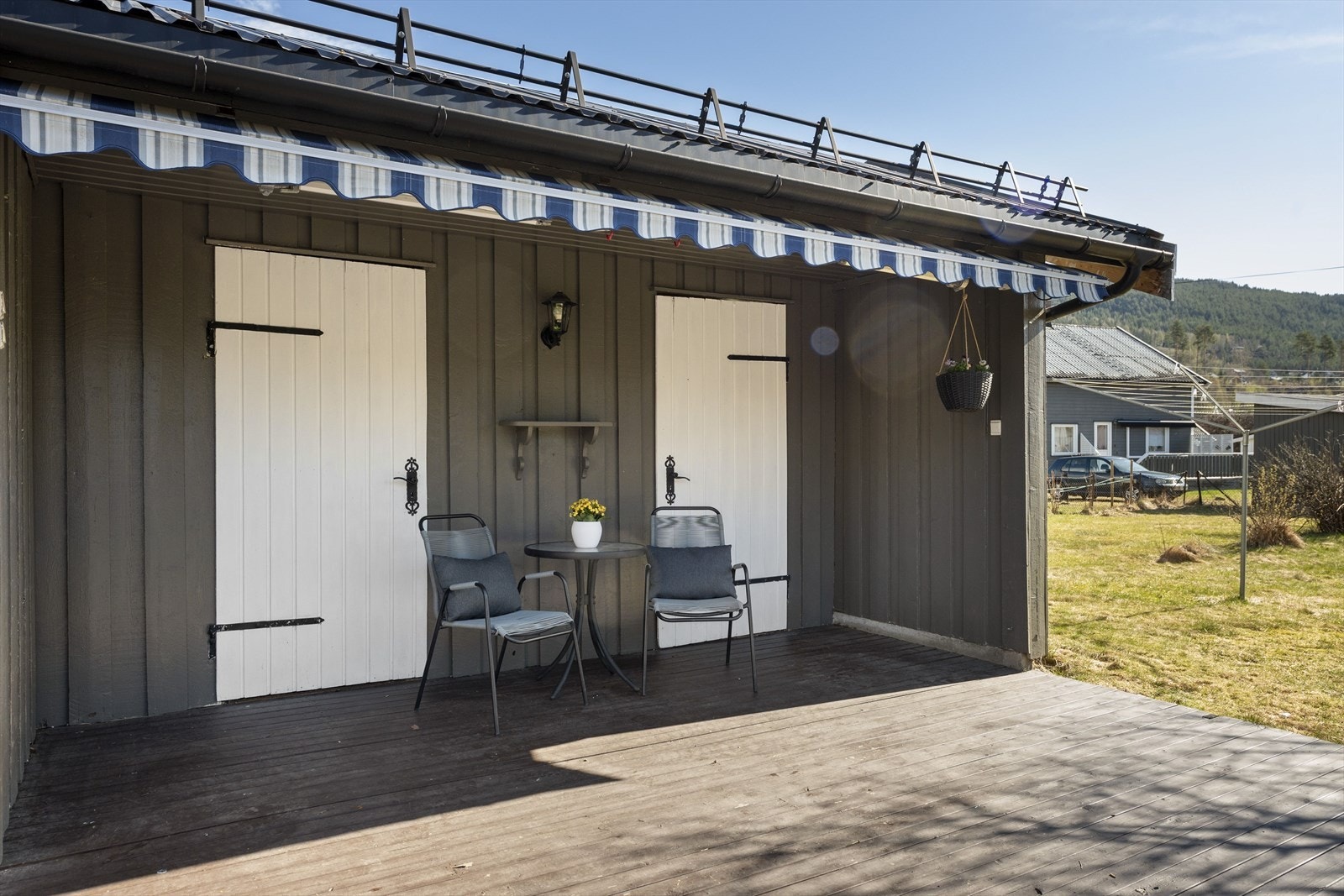 Terrasseplatting med markise Galleribilde