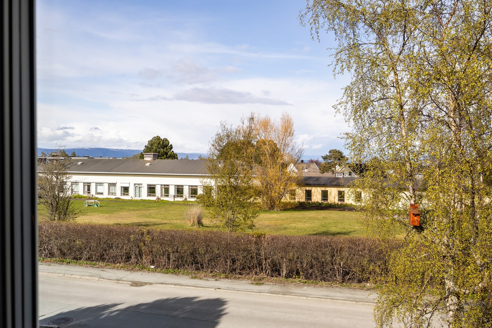 Flotte utsiktsmuligheter over hustakene i retning fjorden. Galleribilde