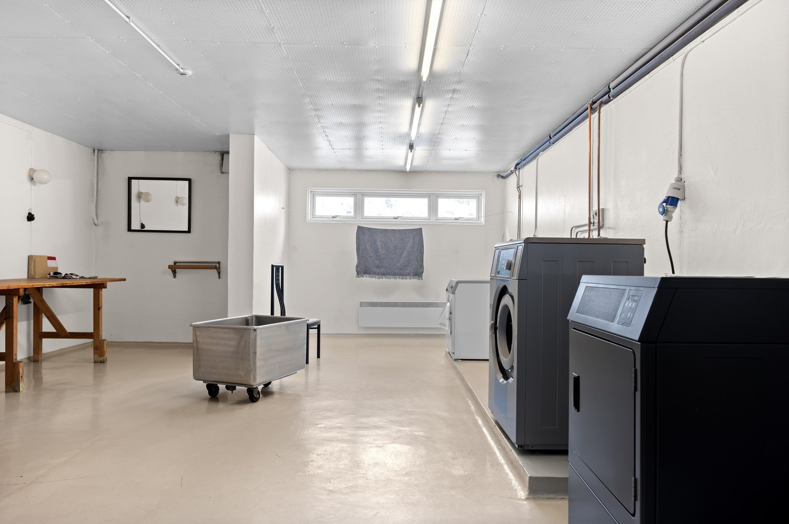 Borettslaget har også et praktisk og romslig fellesvaskeri og treningsrom. Galleribilde
