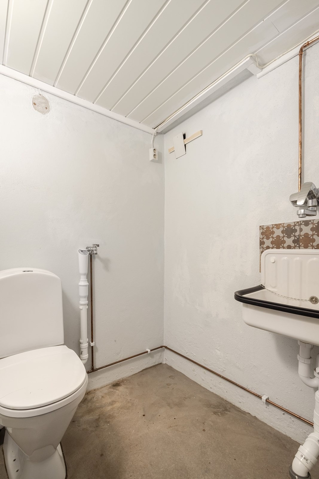 Toalettrom i underetasjen. Galleribilde