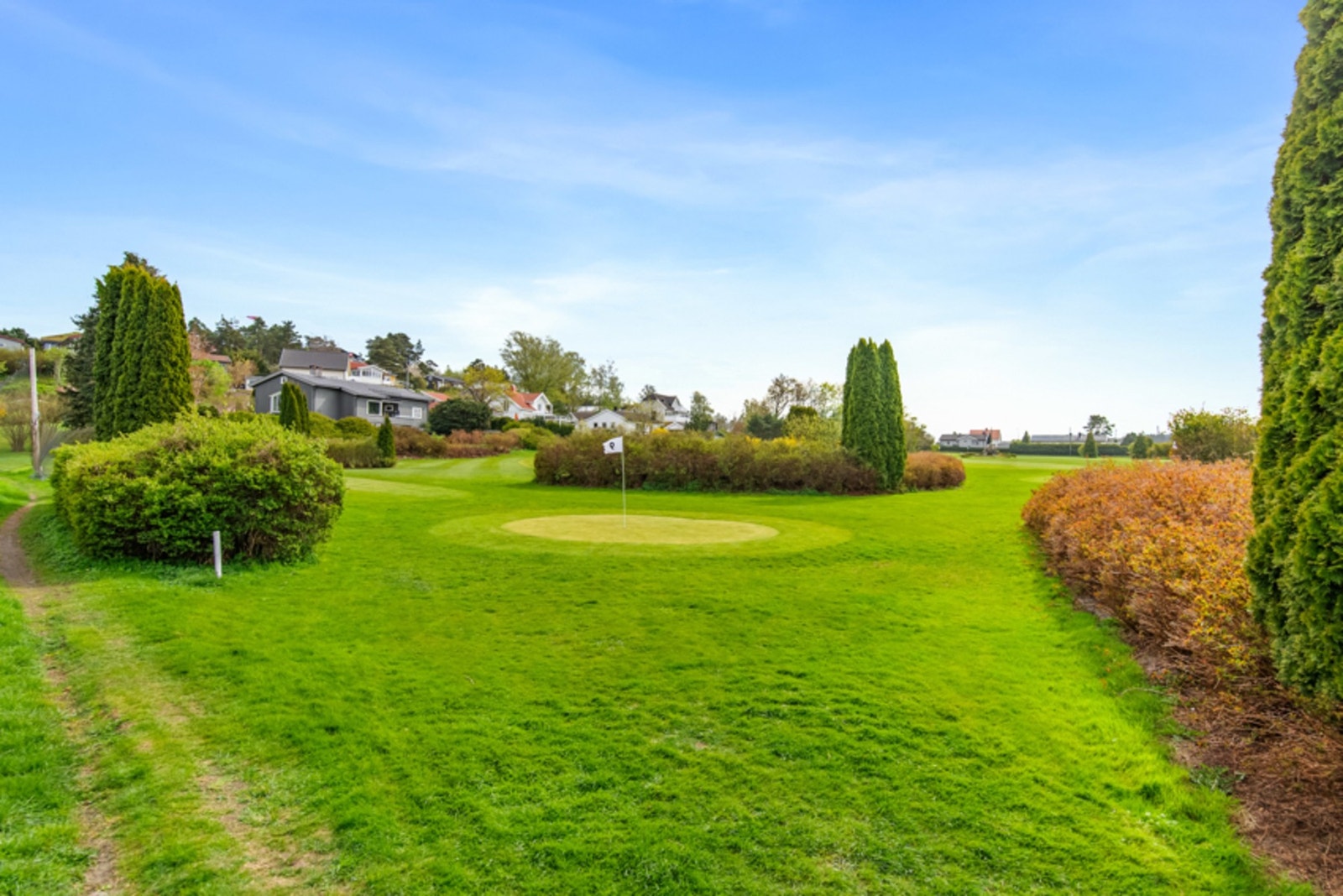 Egen golfbane på Husøy Galleribilde