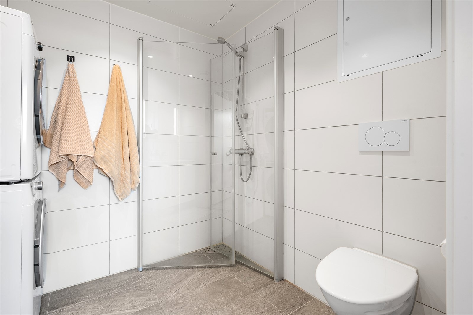 Badet er på romslige 4,5m². I liket med resten av leiligheten har baderommet fått TG0 Galleribilde