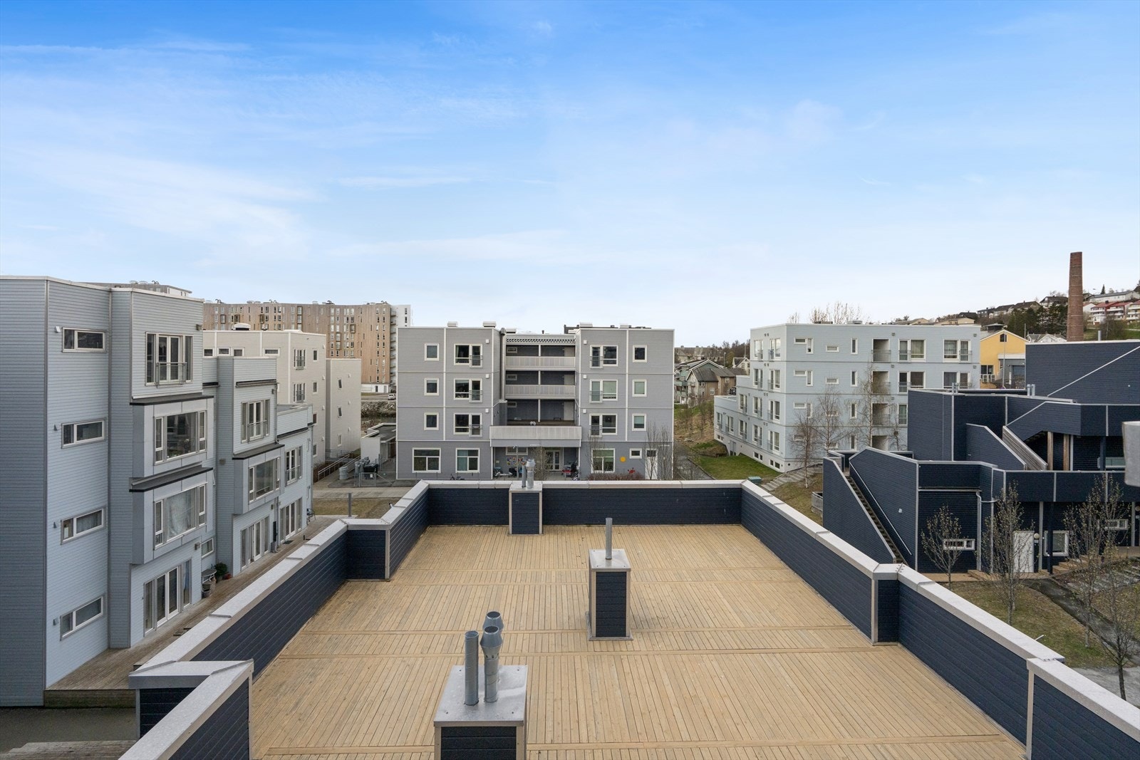 En stor, felles takterrasse er tilgjengelig for beboerne. Galleribilde