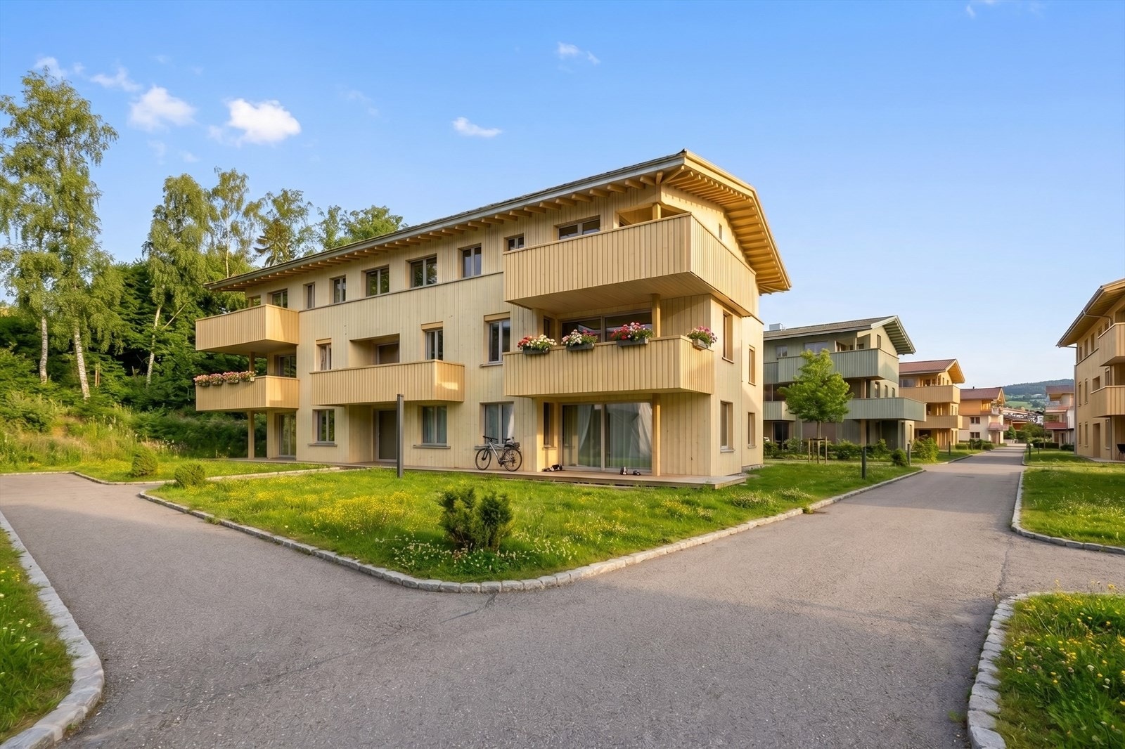 Fasadebilde av leilighetsbygg i BH5. Bilfrie internveier. Bildet er redigert m. KI. Avvik vil forekomme. Galleribilde