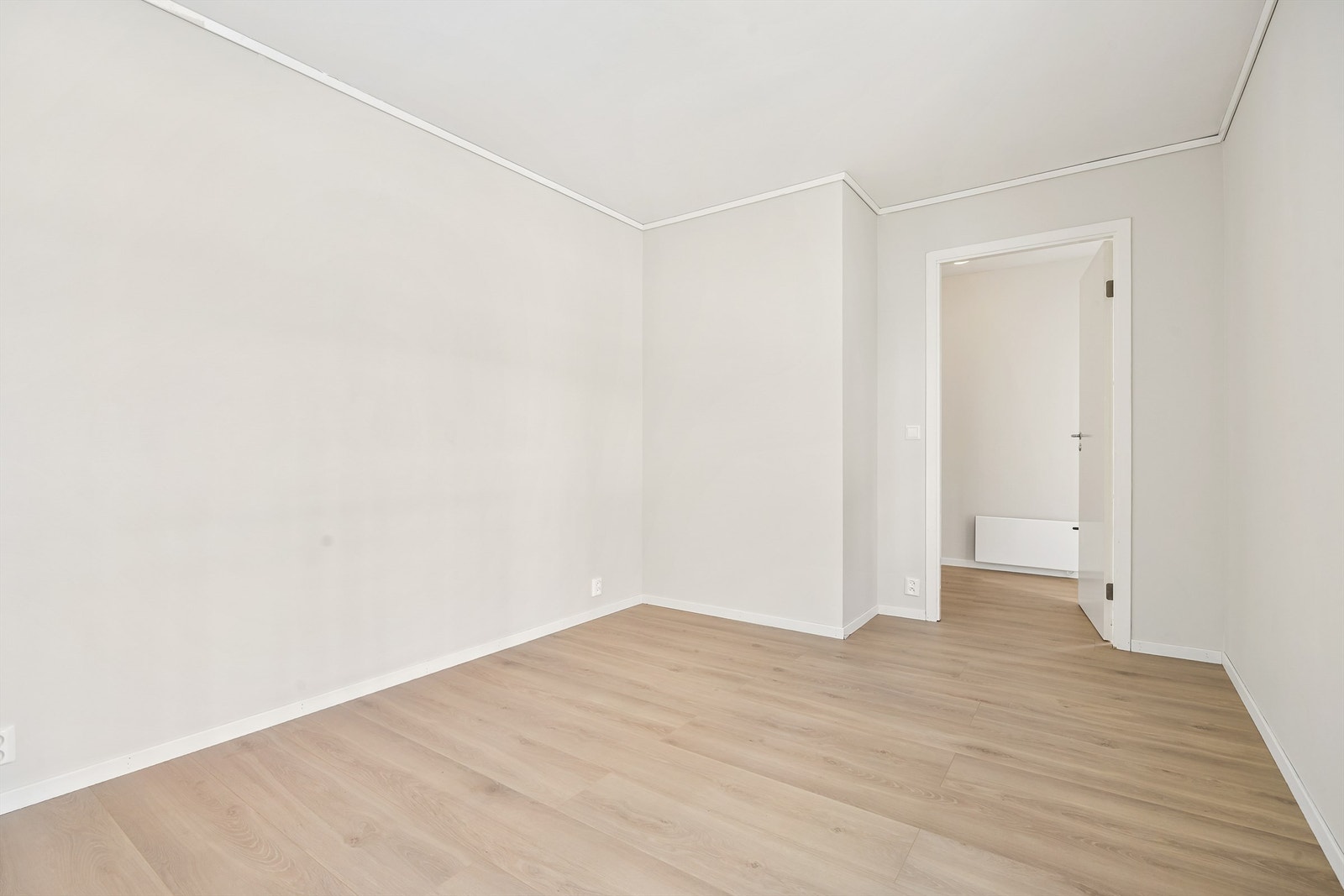 Leiligheten har to soverom, plassert i hver sin ende av leiligheten. Galleribilde