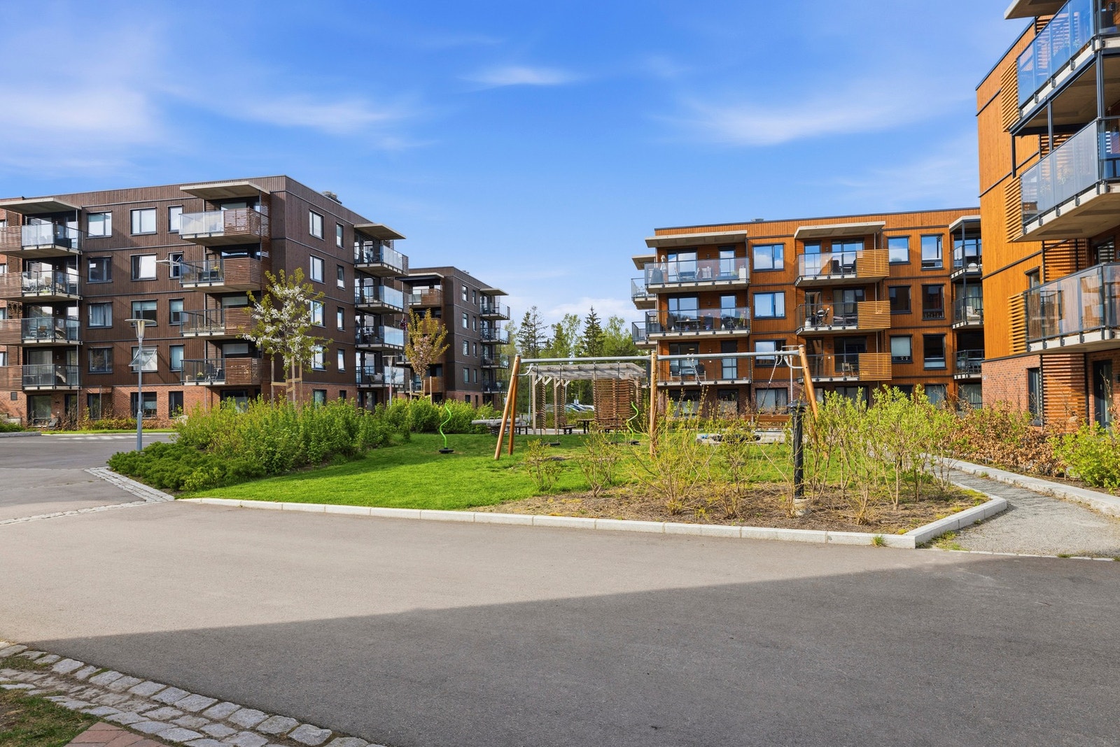 Her er det lagt opp til lekeplasser og sosiale soner for både barn og voksne. Galleribilde