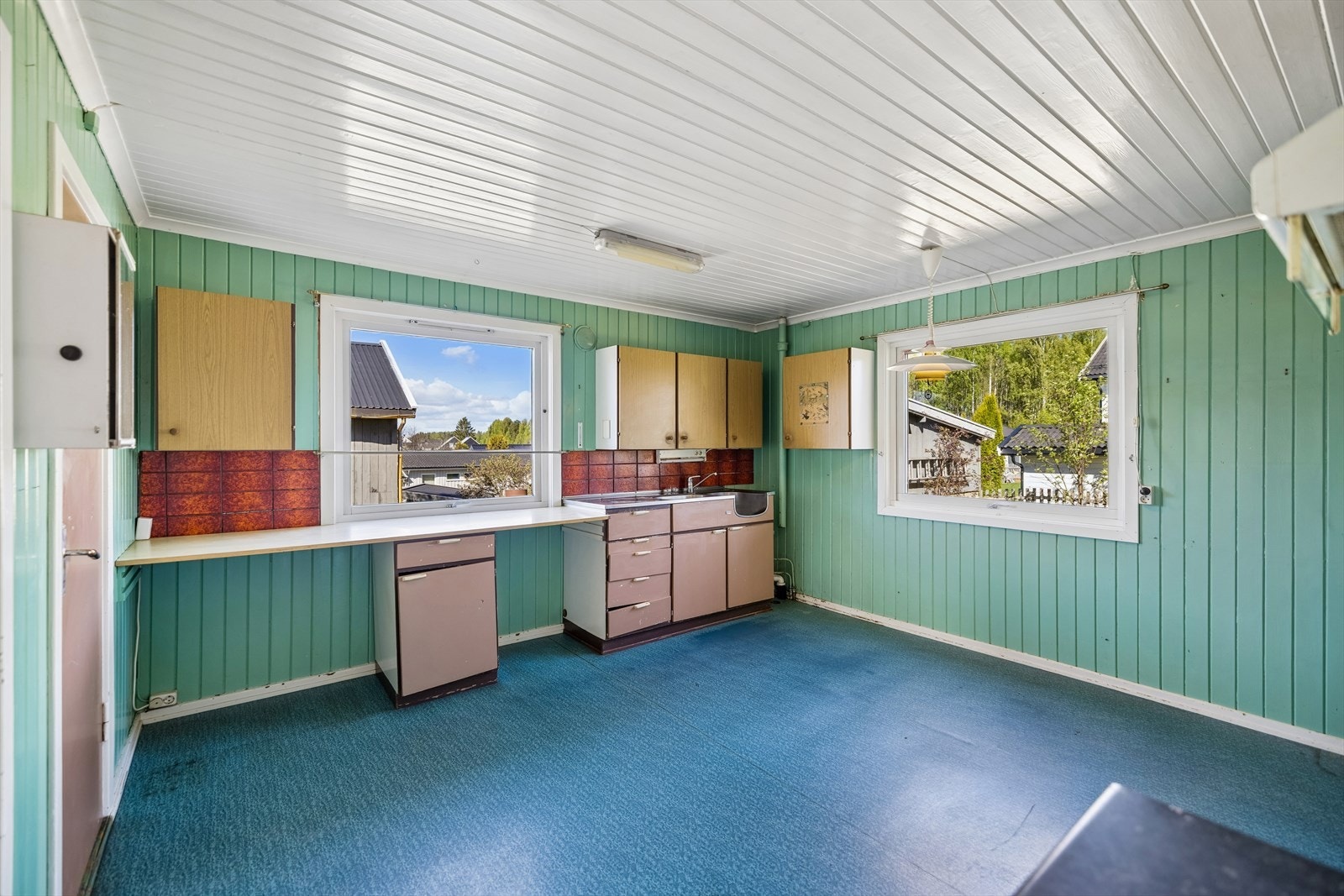 Benkeplaten i laminat gir en slitesterk arbeidsflate. Galleribilde