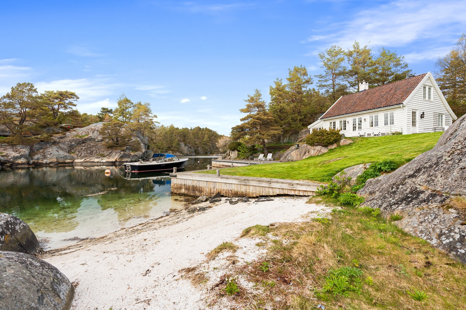 Fra sandstranden som er ypperlig for småbarn Galleribilde