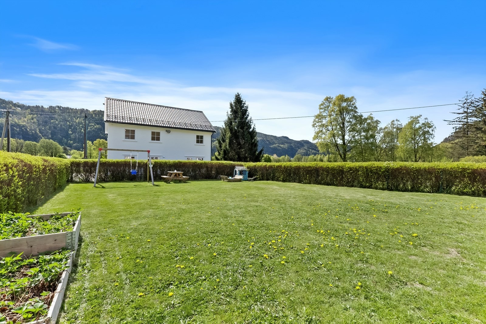 Flat og lettstelt tomt. Galleribilde