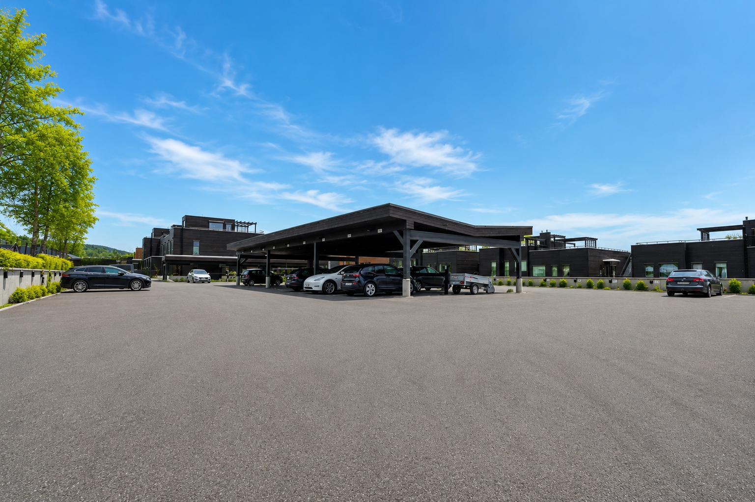 Det er også en god del gjesteparkeringer på området. Bildet er AI generert for å vise sesong. Galleribilde