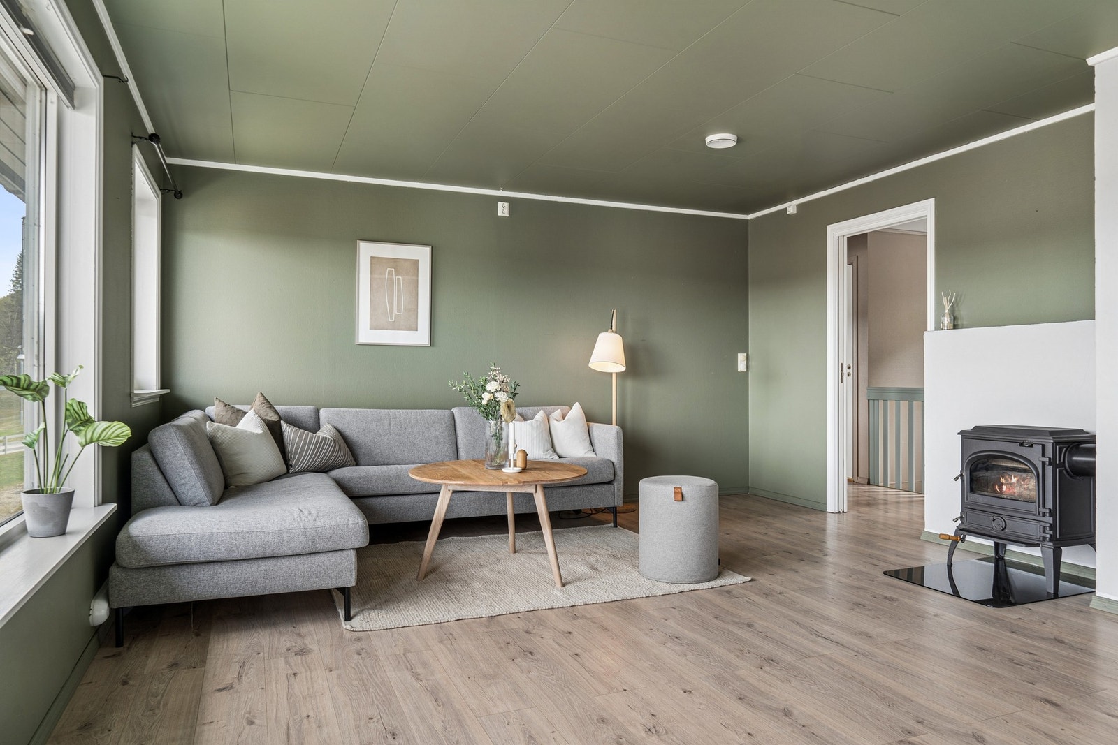 En sentralt plassert vedovn gir effektiv og lun varme. Galleribilde