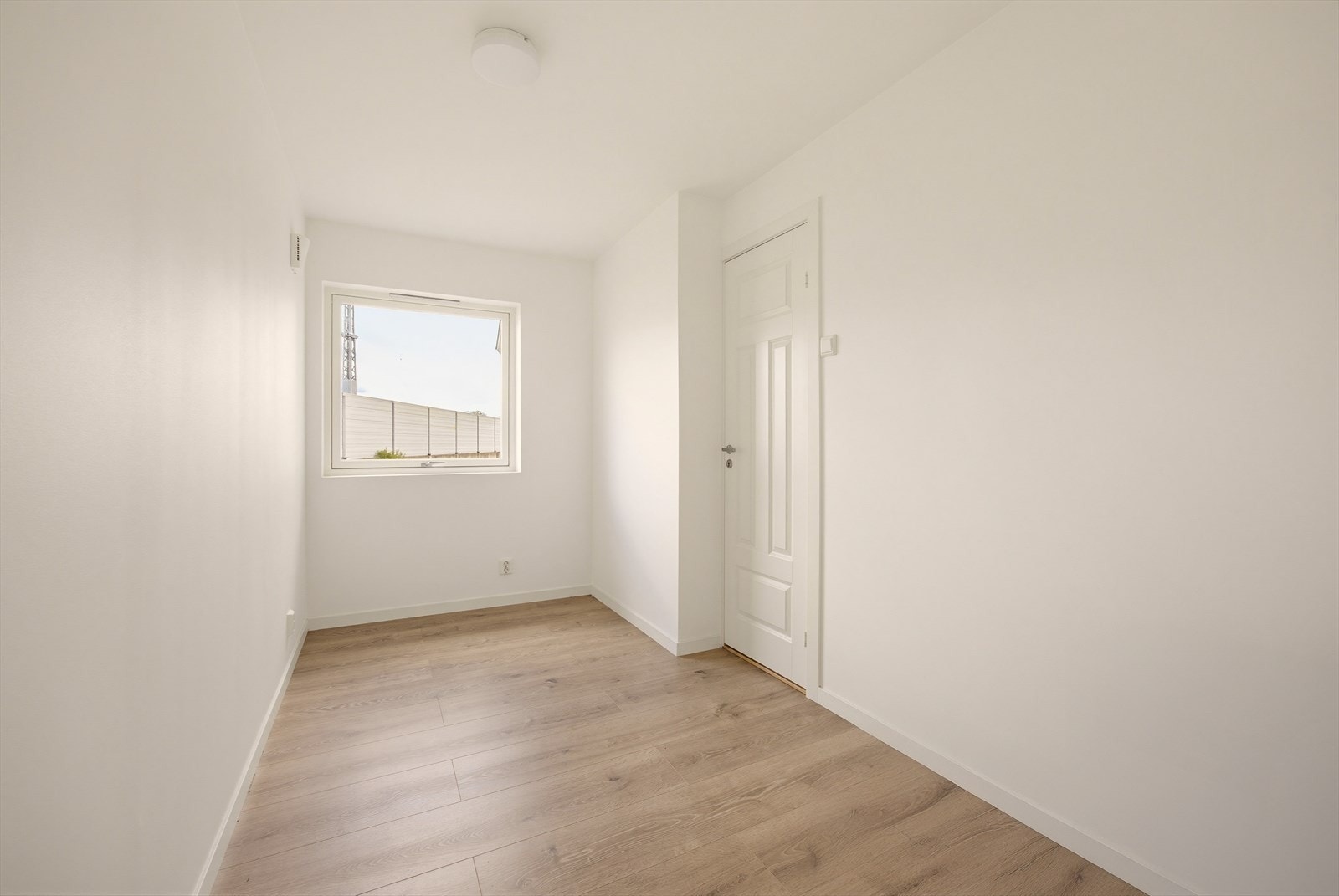 Et av de totalt fire soverommene i enhet 1B. Galleribilde