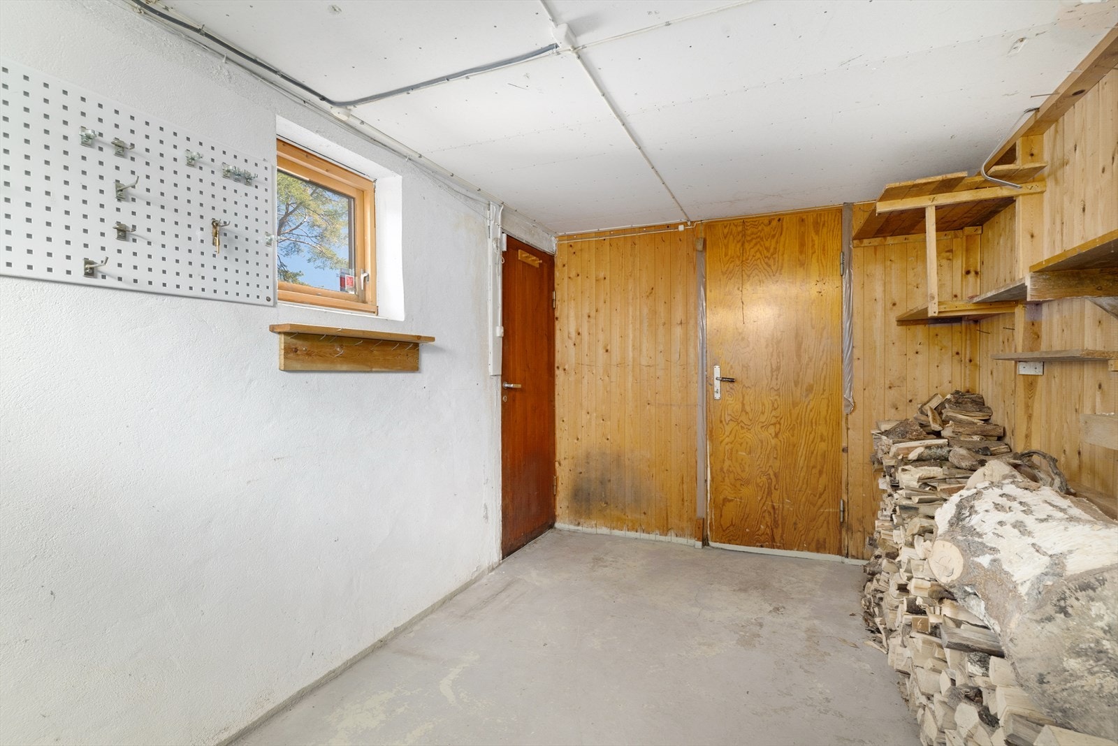 En av bodene i kjelleren er et omgjort tidligere garasjeareal. Galleribilde