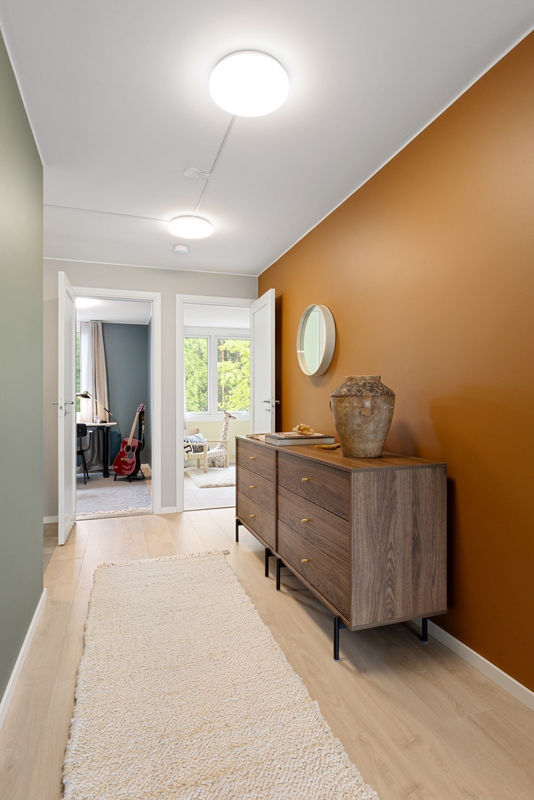 Gangen leder inn til soveromsavdelingen, adskilt fra de sosiale sonene. Galleribilde