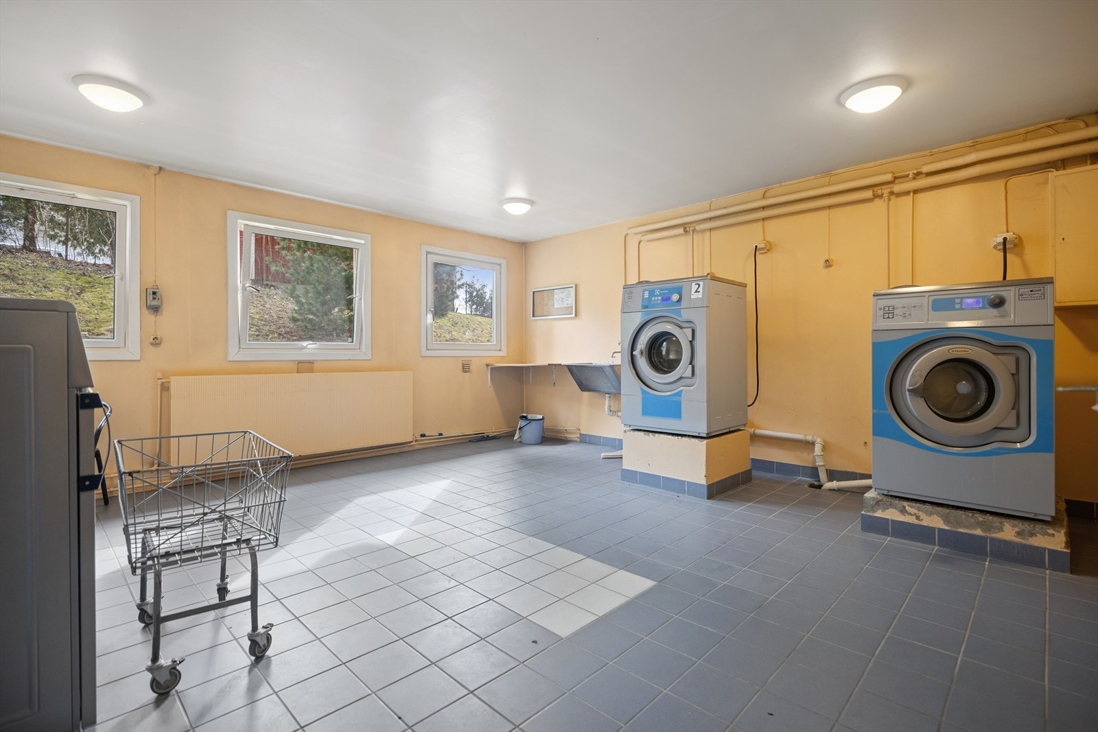 Borettslaget har tilgjengelig fellesvaskeri. Galleribilde