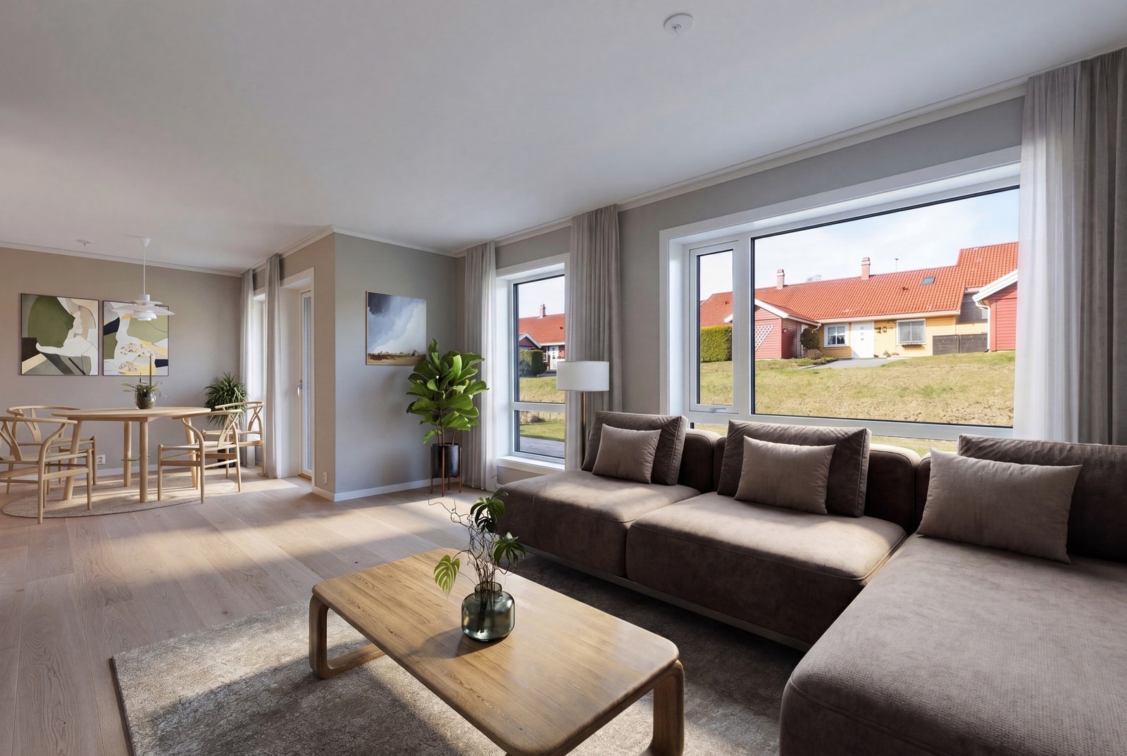Med store vindusflater oppleves leiligheten som romslig. Digital styling. Galleribilde