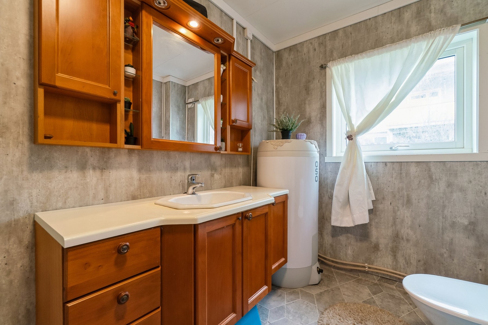 Her kan det settes inn ny baderomsinnredning, slik at badet kan fremstå mer moderne. Galleribilde