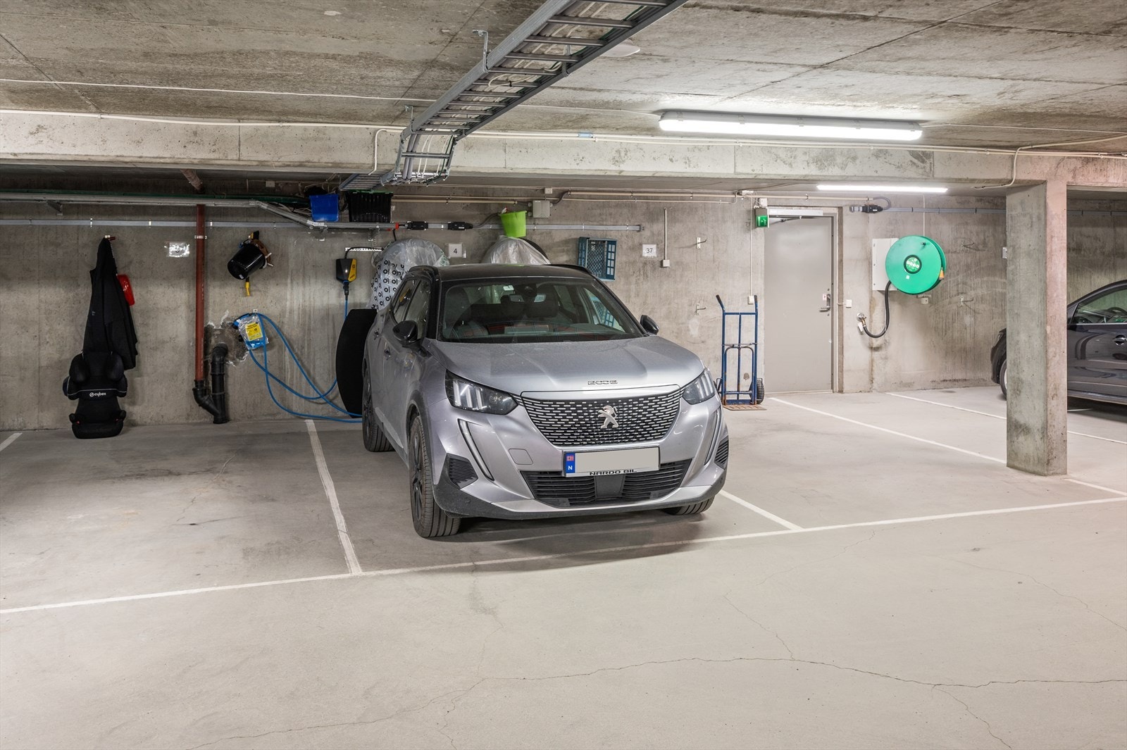 Leiligheten har parkeringsplass i parkeringskjeller Galleribilde