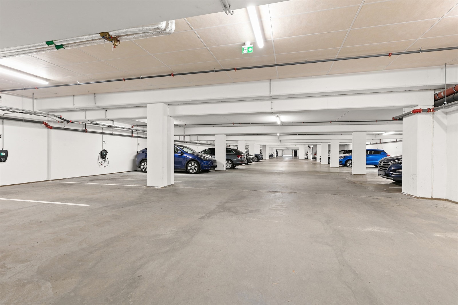 To garasjeplasser i felles parkeringsanlegg følger boligen. Galleribilde