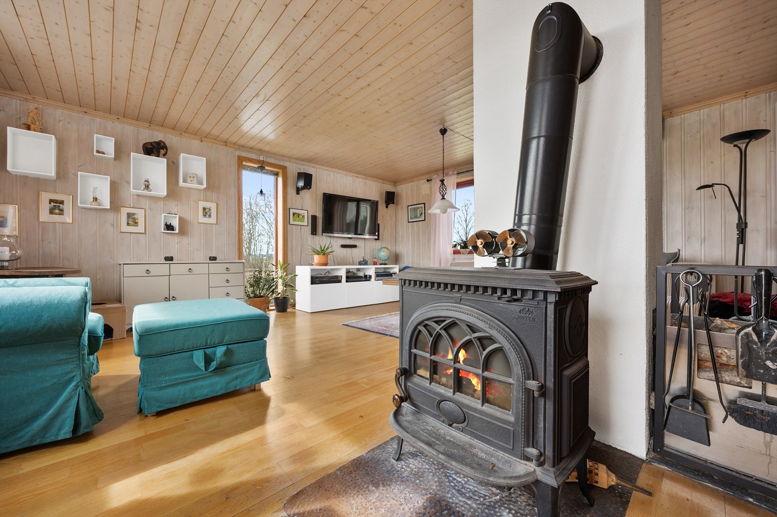 Peisen gir god og lun varme i stuen. Galleribilde