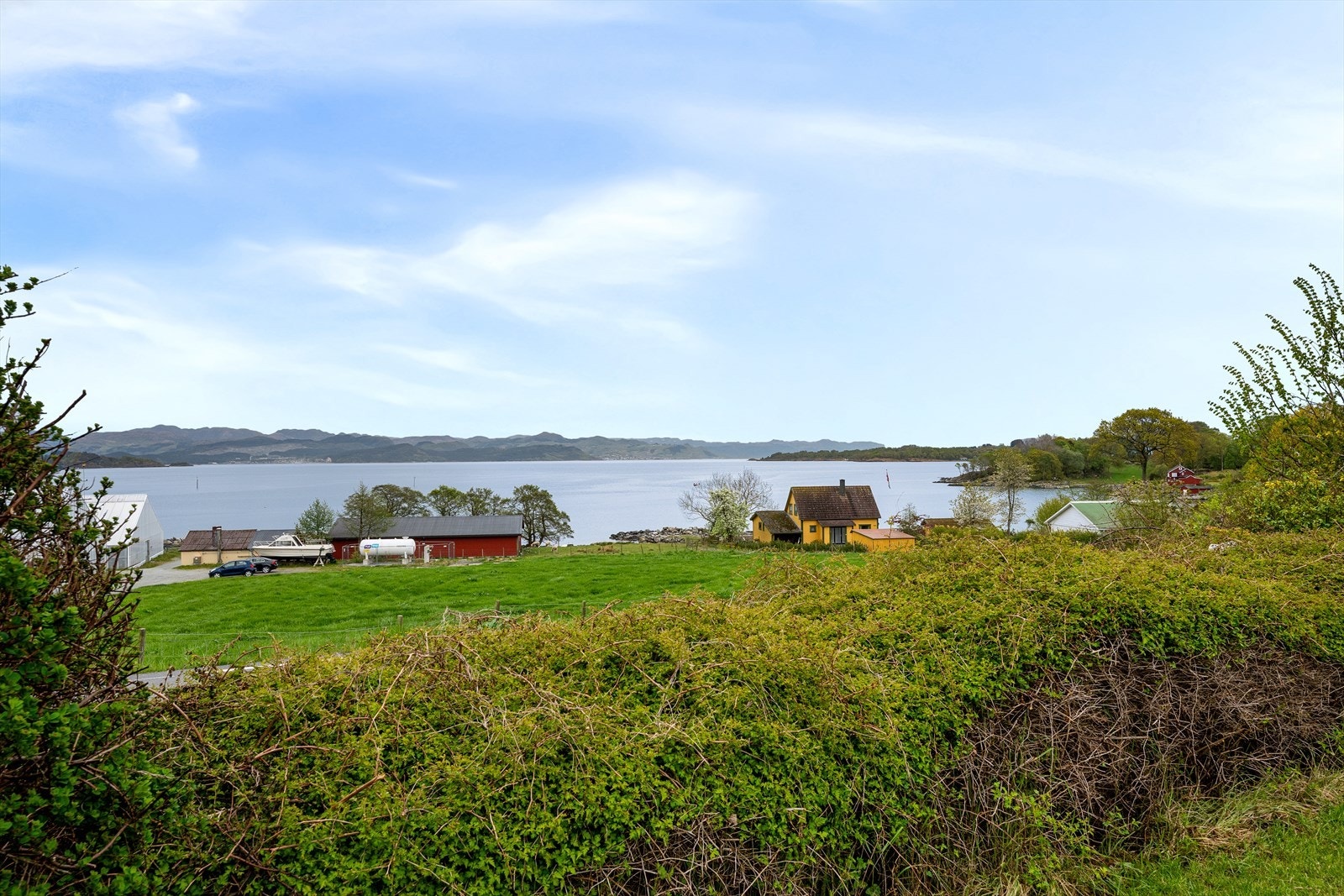 Beliggenhet i landlige omgivelser på Rennesøy. Galleribilde