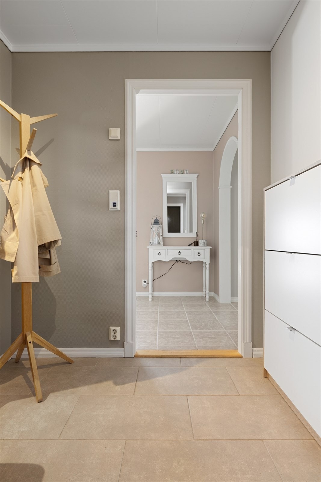 Gjennomgående materialvalg skaper en helhetlig følelse. Galleribilde